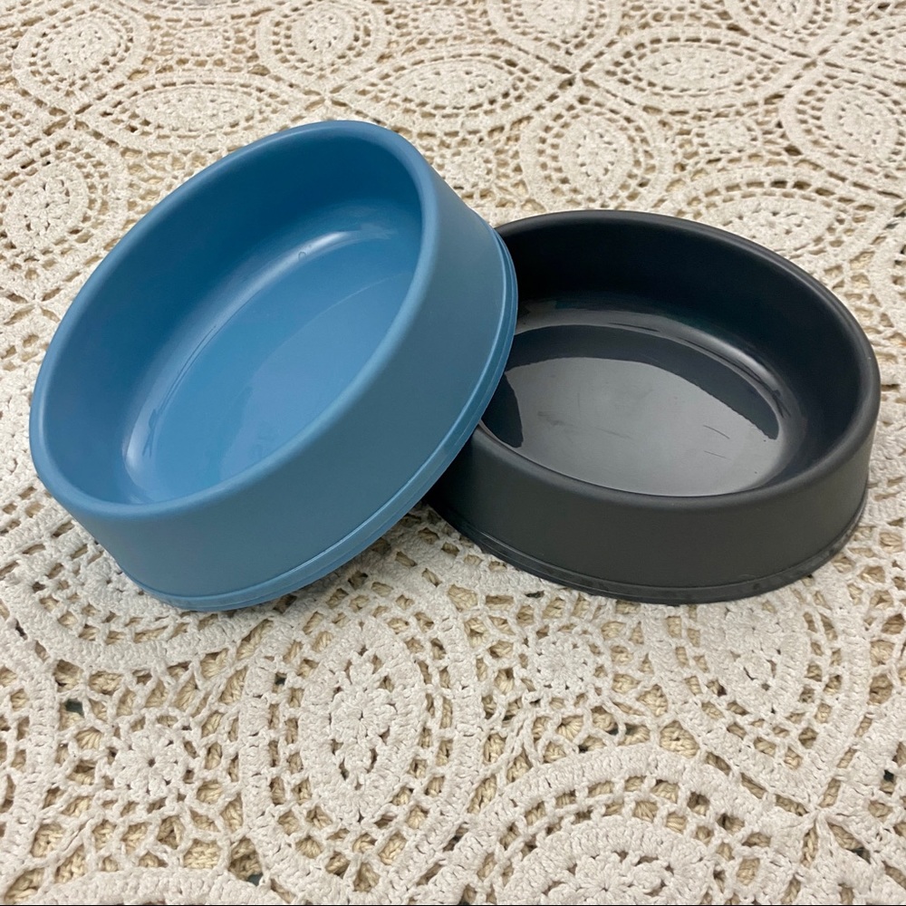 Two pet food + water bowls